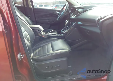 2015 Ford Escape Titanium z USA, uszkodzony, nr VIN 1FMCU9J96FUC85139